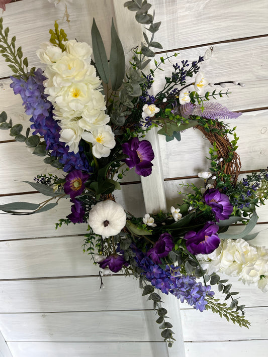 Artificial floral wreath