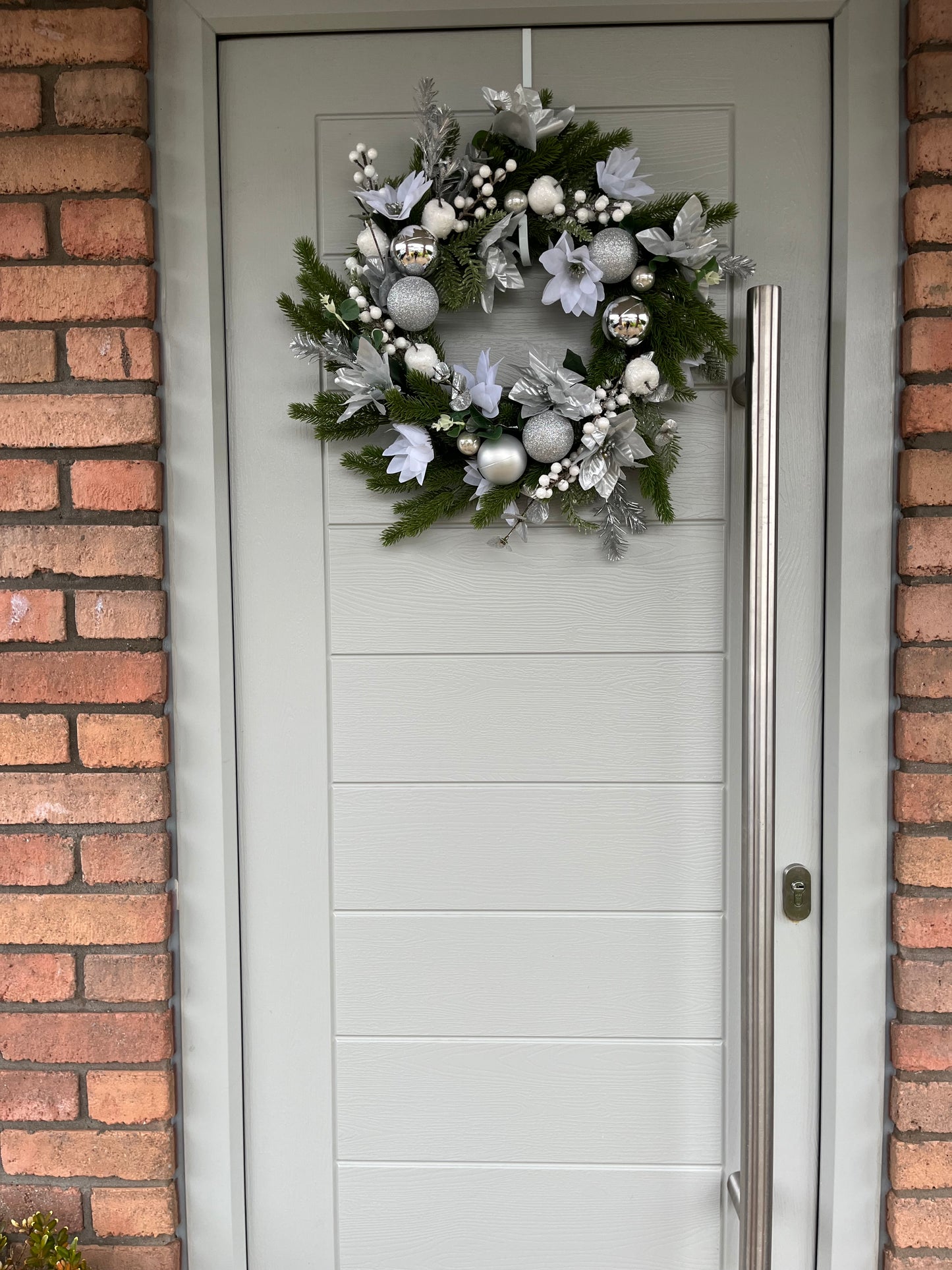 Christmas style artificial floral wreath